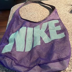 Nike gym tote.  Mesh type material that you can wash.